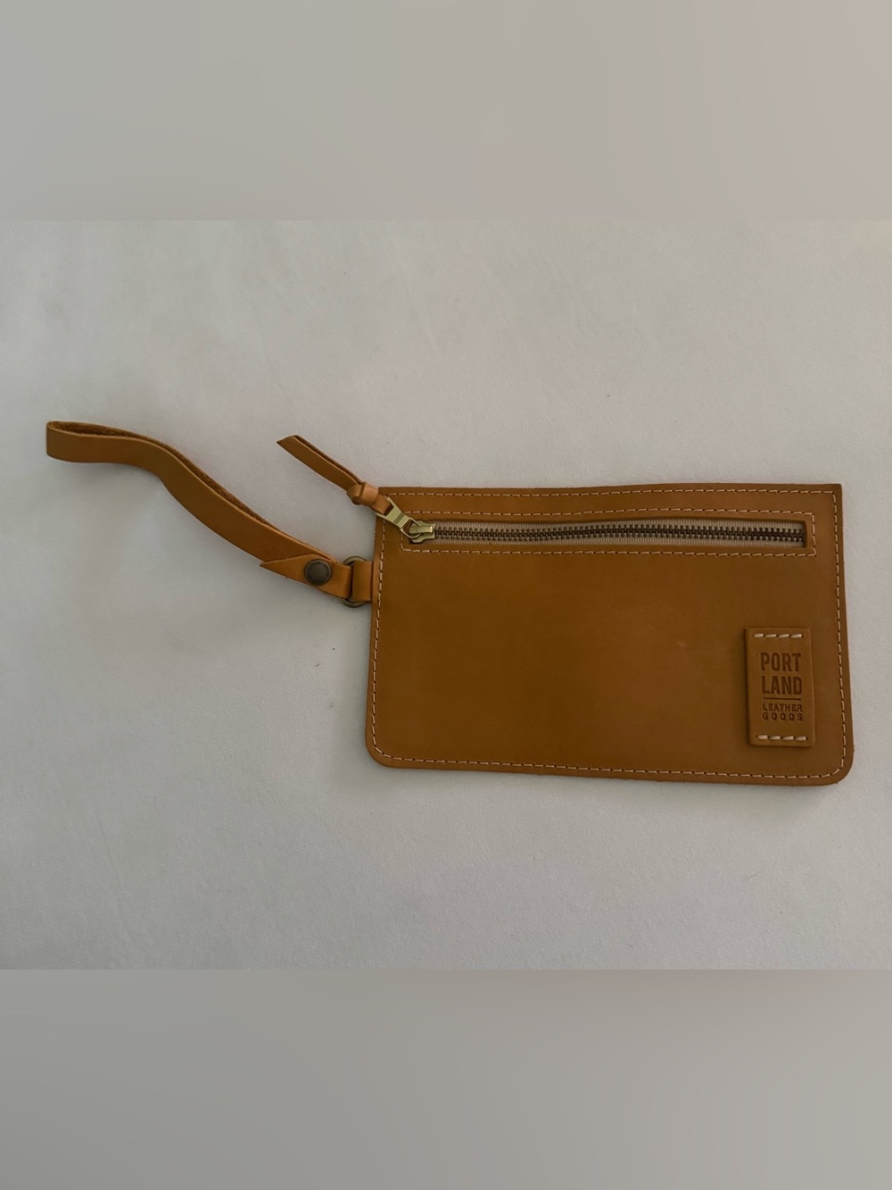 NWOT Portland Leather tan wristlet. Gorgeous leather. Roughly 8 x 5".